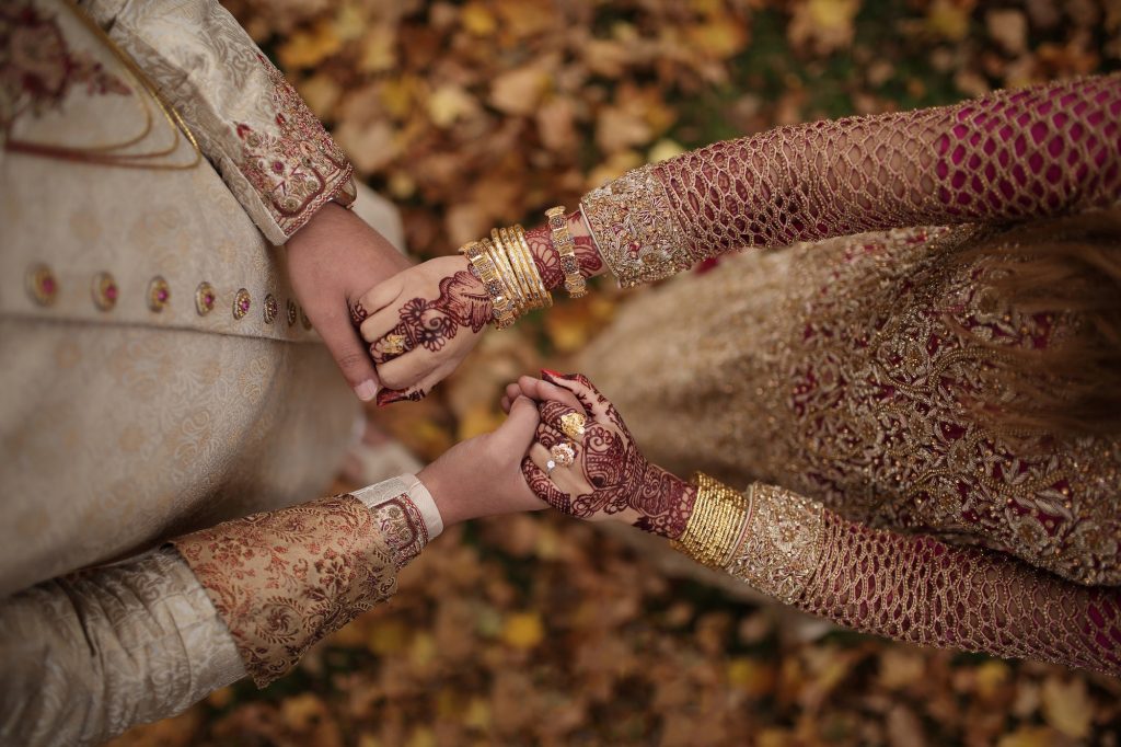 Indian wedding, bride and groom in traditional wedding attire