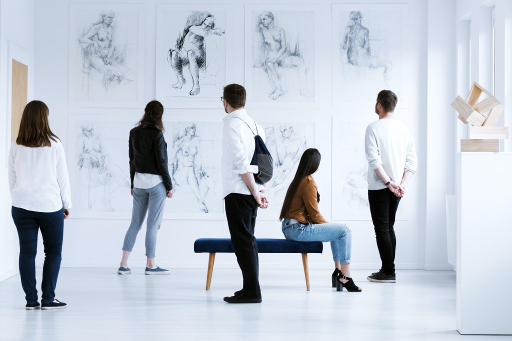 Visitors in art gallery